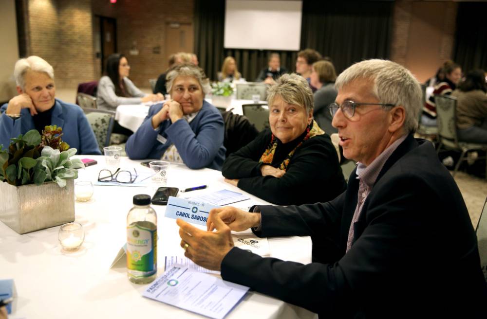 Jeff Kelly Lowenstein shares his thoughts during a table discussion